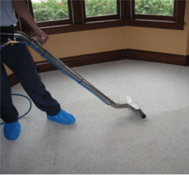 Commercial carpet extraction in progress